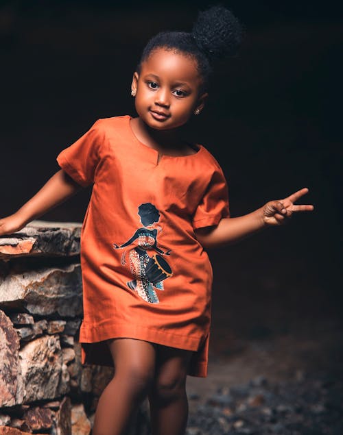 Cute Girl Posing in Traditional Dress