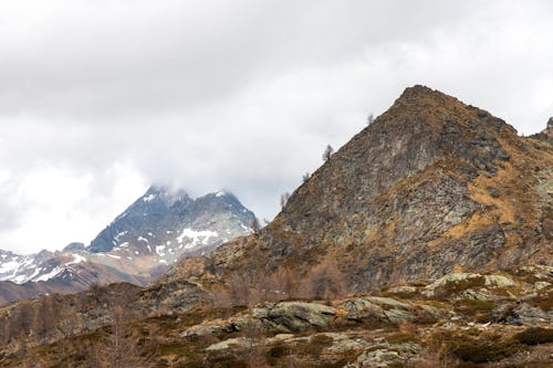 岩山, 曇り空, 灰色の空の無料の写真素材