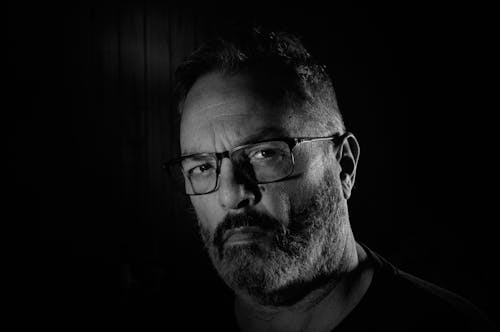 Monochrome Portrait of a Man with Eyeglasses