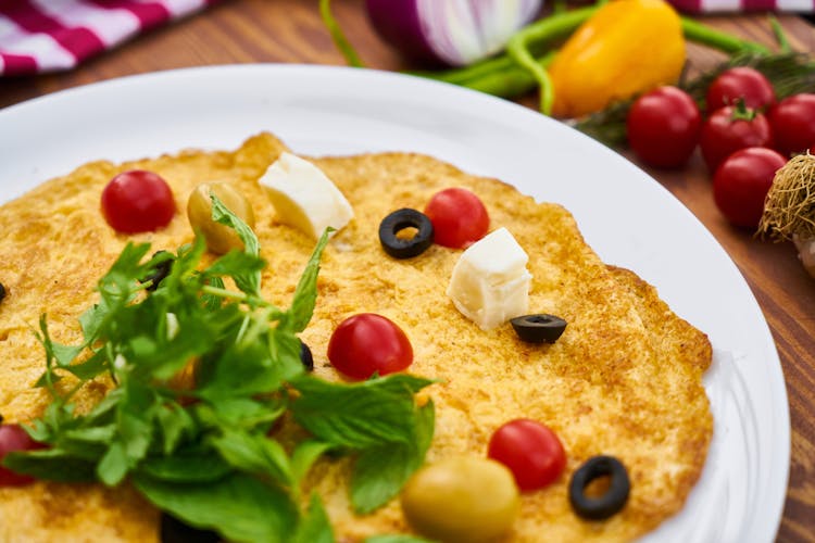 Selective Focus Photography Of Omelette With Toppings