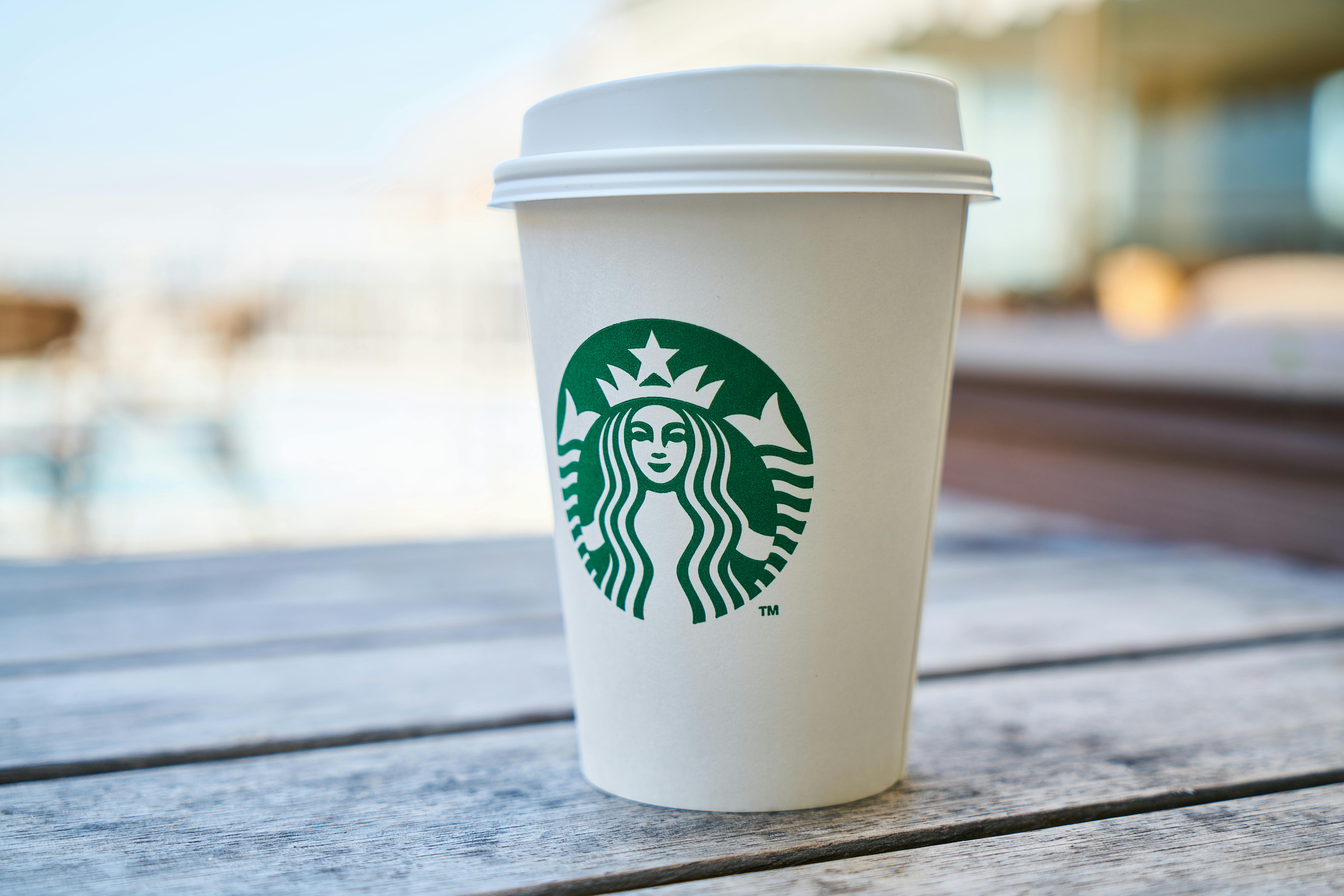 Closed White and Green Starbucks Disposable Cup \u00b7 Free Stock Photo