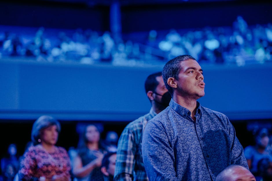 Promotional booth setup at a trade show with modern design and vibrant colors