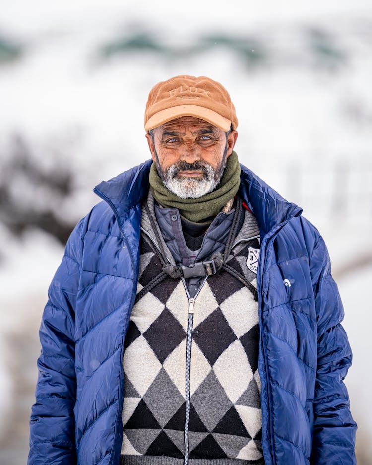 Elderly Man In Winter Clothing 