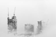 Photo of Skyscrapers Surrounded With Clouds