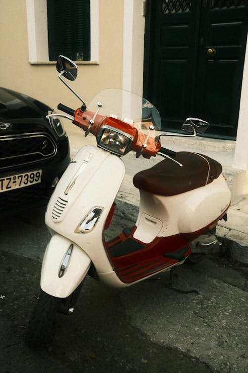 White and Red Motor Scooter