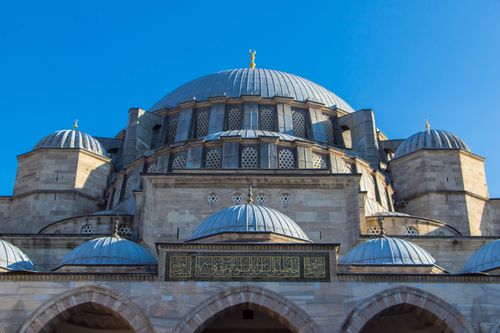 Free Close-up view of Suleymaniye Mosque, showcasing Ottoman architecture against a vibrant blue sky. Stock Photo