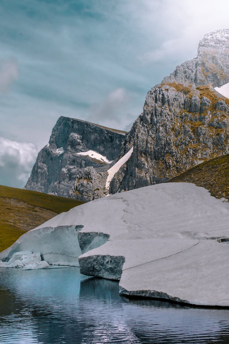 Ice Near Water And Rocks