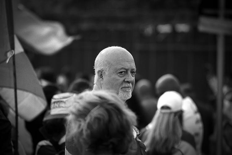 Bald Man In Crowd