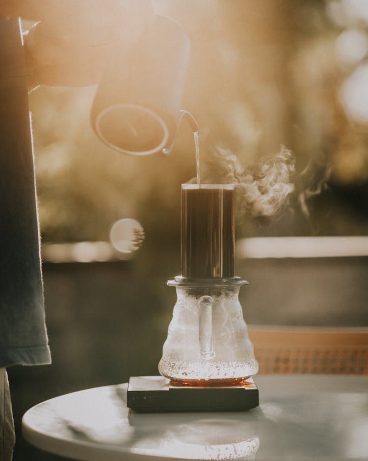 Pouring Water To Coffee