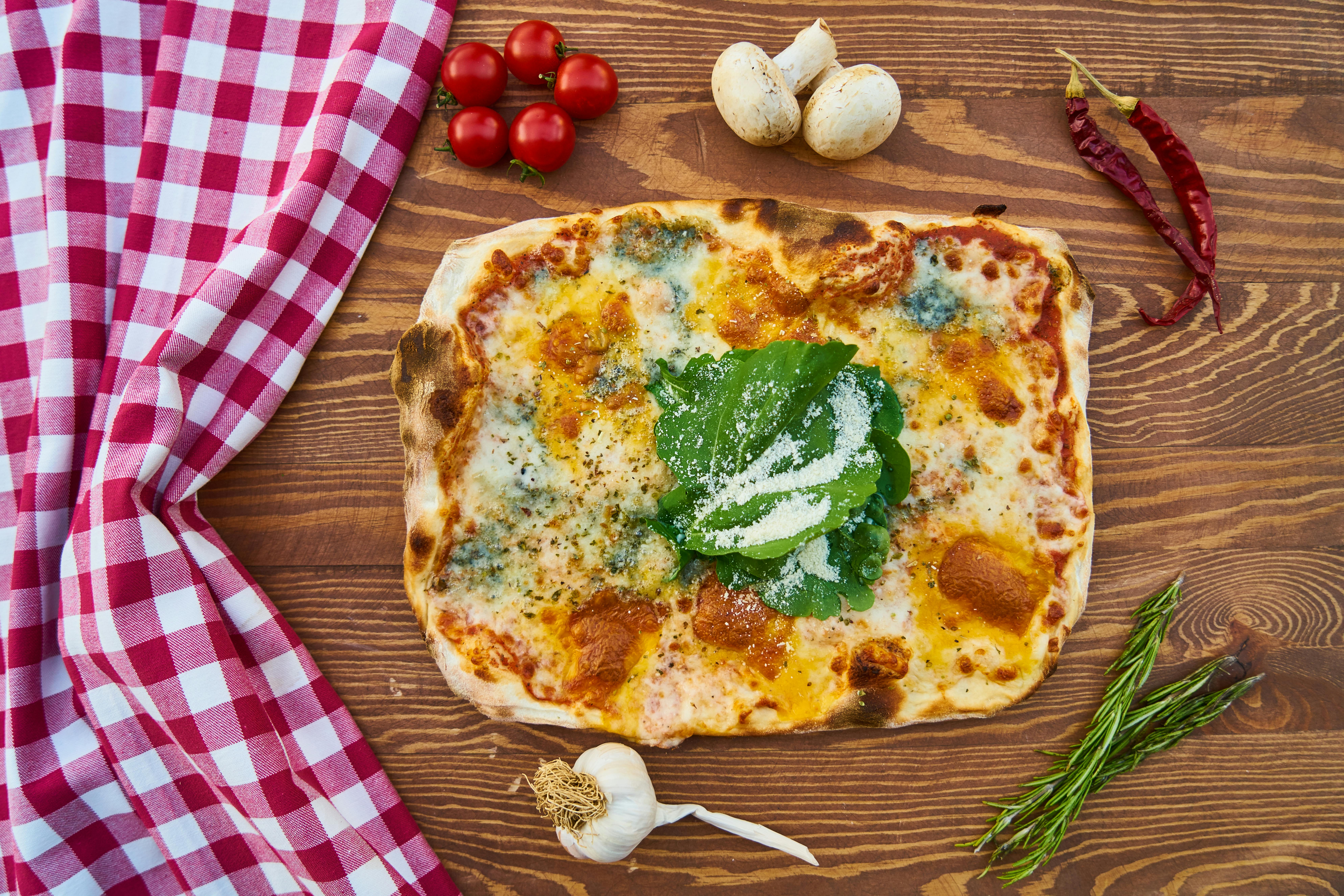 Baked Pizza on Board · Free Stock Photo