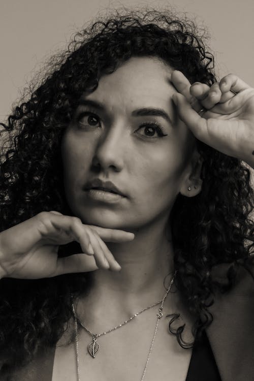 Black and White Portrait of a Woman with Curly Hair