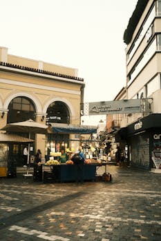 Captivating view of Athens Flea Market with vendors selling goods and shoppers exploring the area.