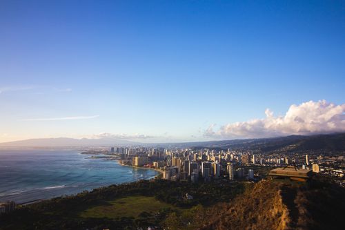 Free Stunning aerial view of Honolulu cityscape from Diamond Head, showcasing the Pacific Ocean. Stock Photo