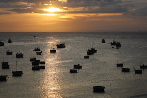 Silhouettes of Watercrafts on the Sea