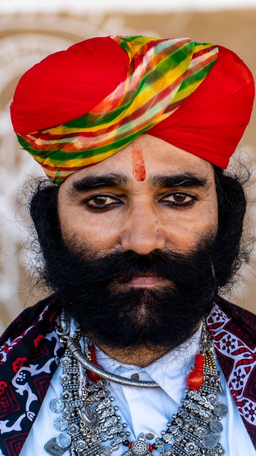 An Elderly Man in White Long Sleeves Wearing a Turban · Free Stock Photo