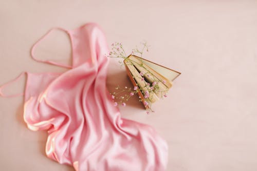 Pink Nightie Beside a Book