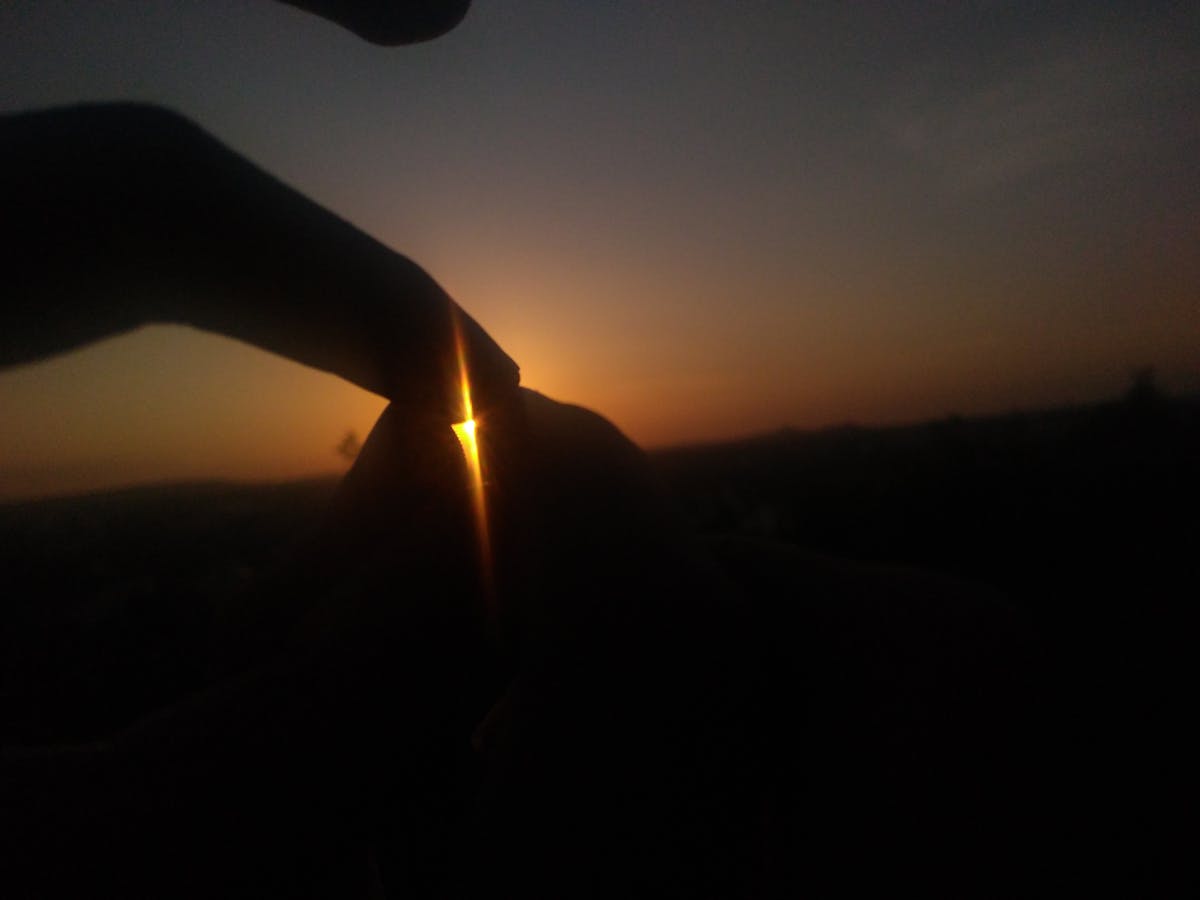 Technician using precision screwdrivers to open a laptop for repair