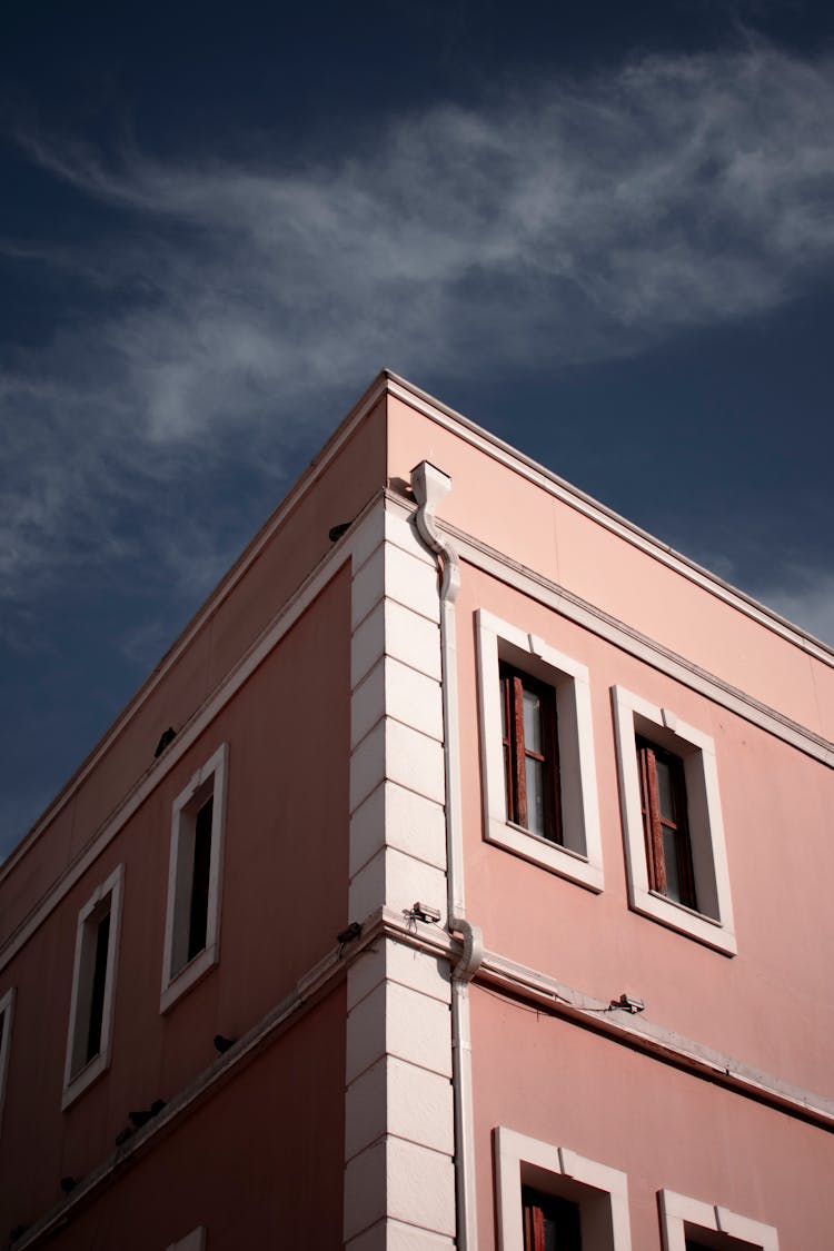 Brown Concrete Building Under Blue Sky