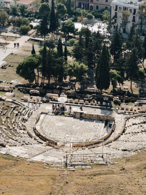 Explore the remnants of an ancient Greek theatre from a high vantage point.