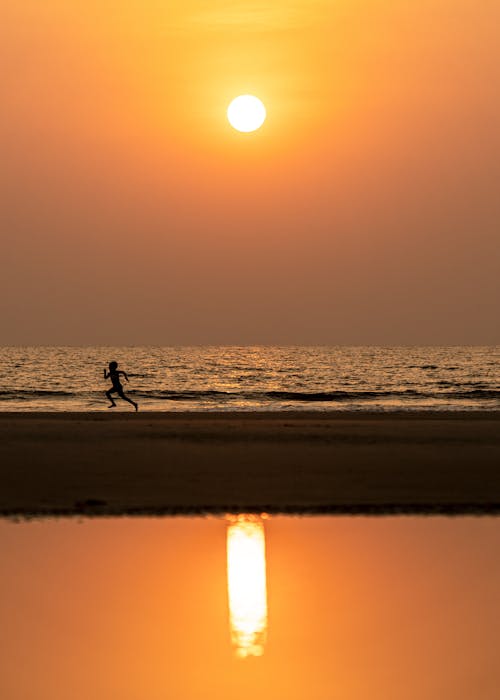 Foto profissional grátis de à beira-mar, alvorada, alvorecer