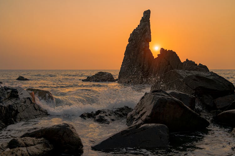 Beautiful Sunset On An Ocean Coast With Rock Formations 