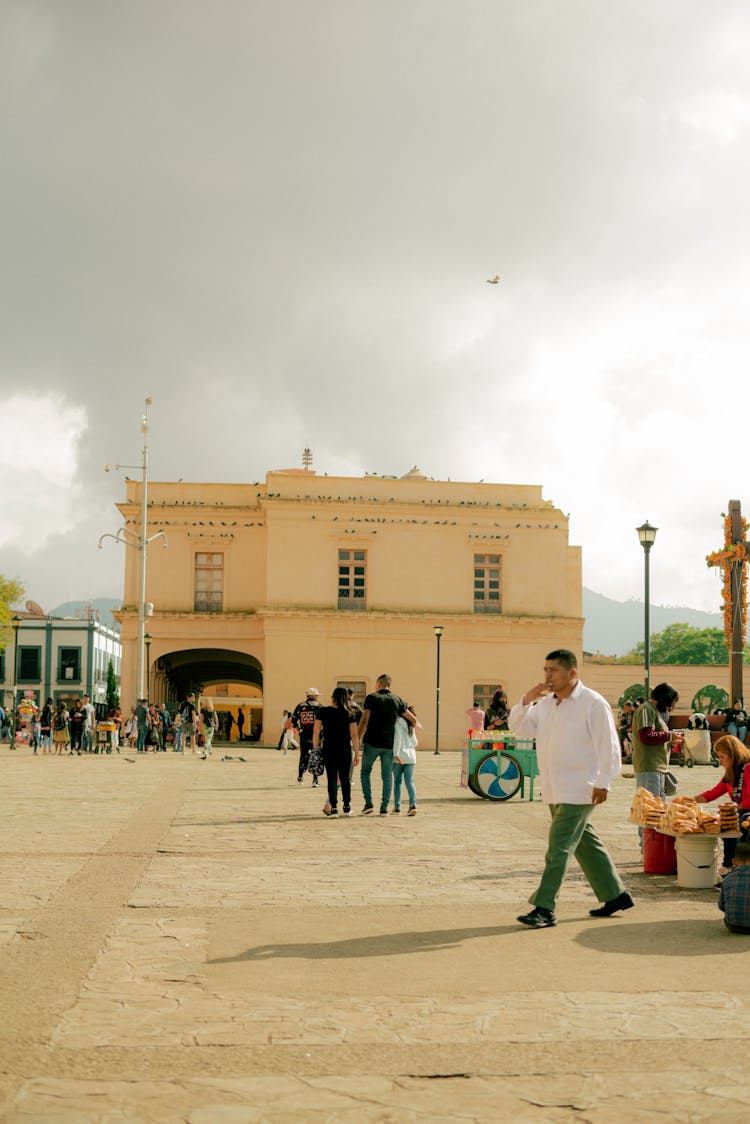 People Walking In Public Square