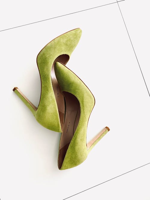 Free Green High Heels on Tiled Floor Stock Photo