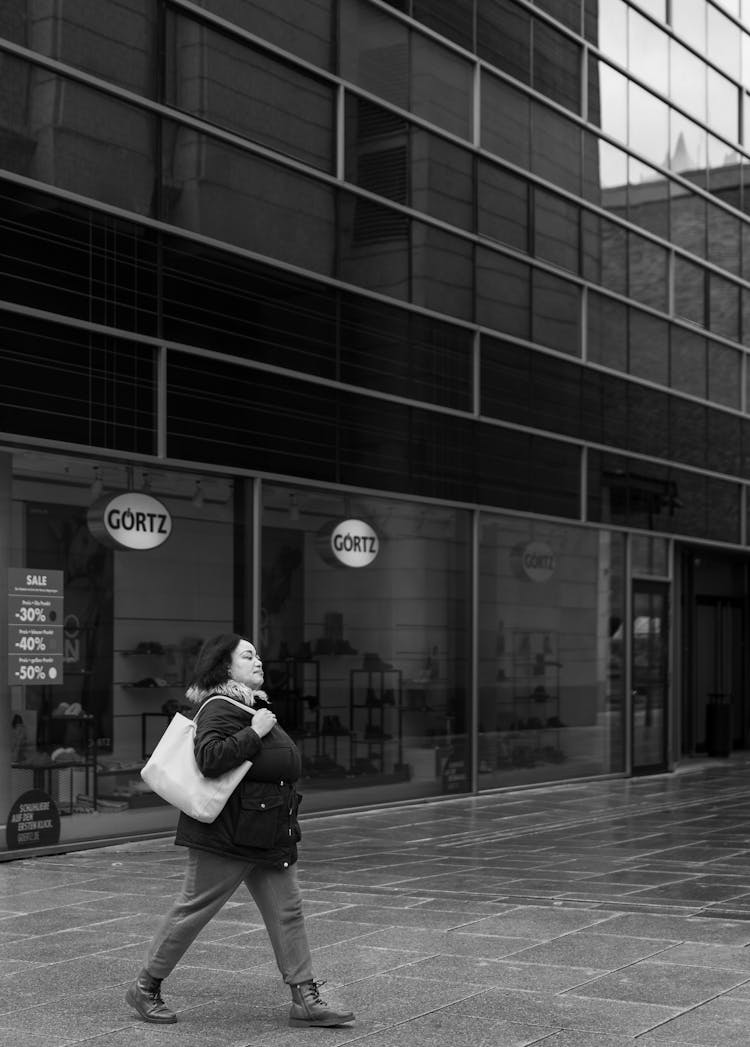 Woman Walking On A City Street