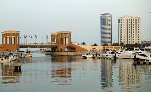 Brown Concrete Bridge and Boats