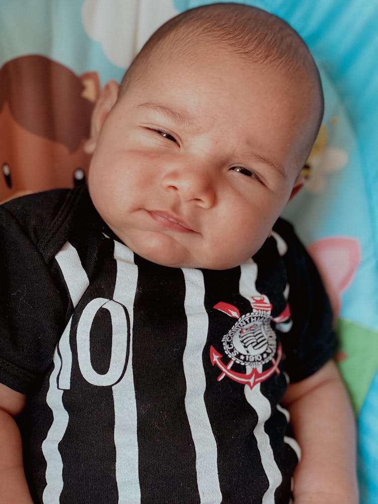 Baby In Black And White Stripe Shirt