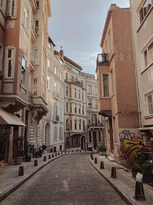 An Empty Street Between Buildings