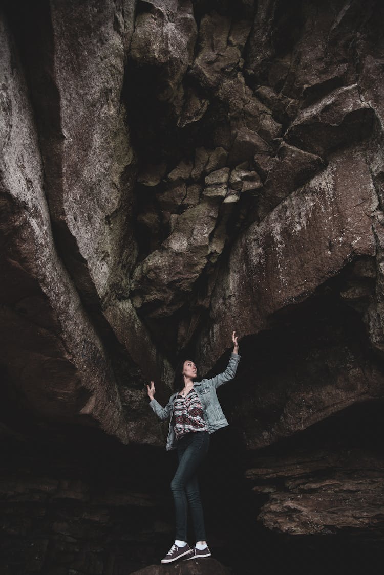 Woman Inside A Cave