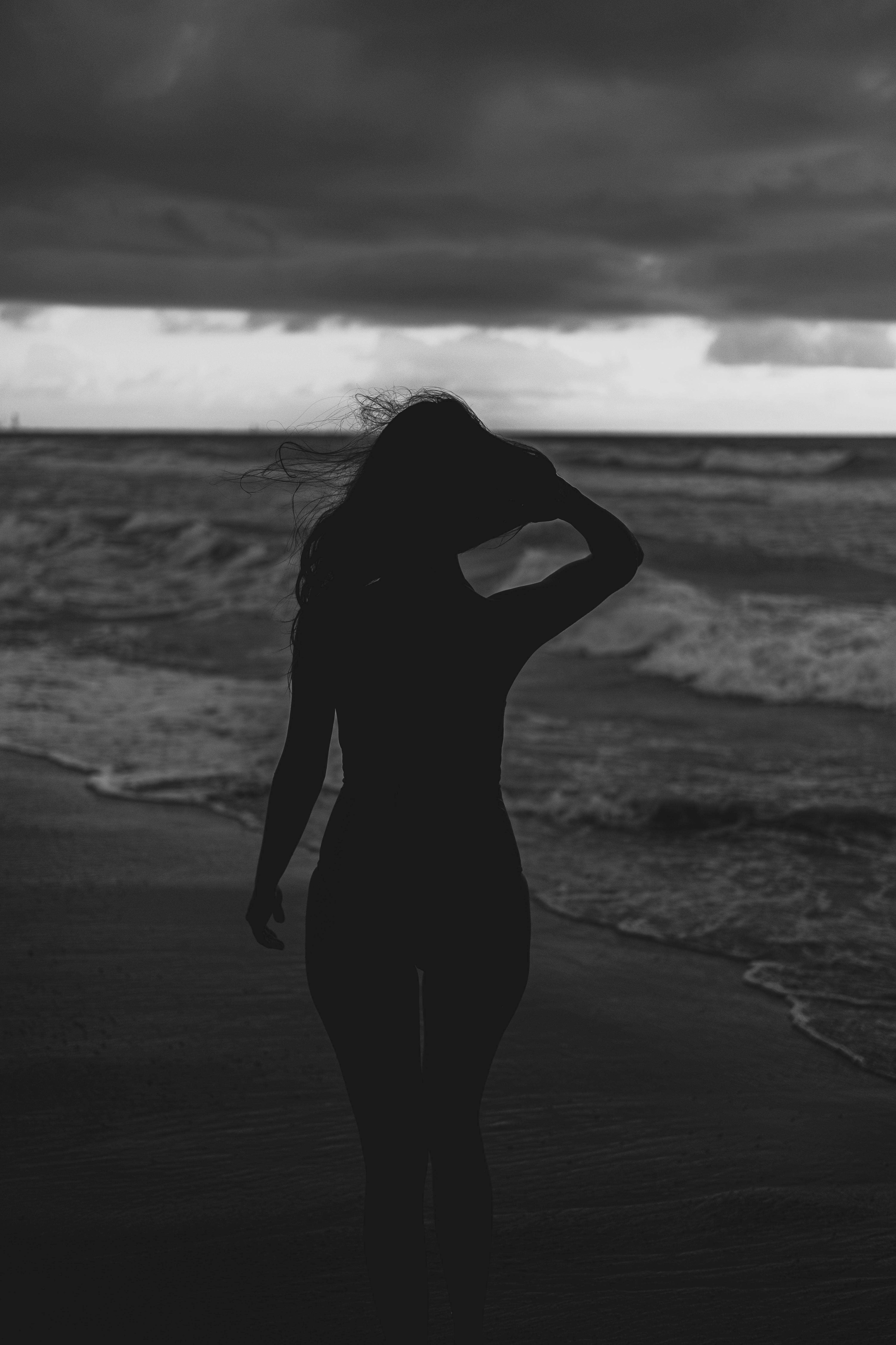 Sexy Woman Walking on Beach Shore · Free Stock Photo