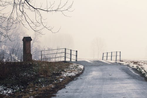 Gray Concrete Road With Mist