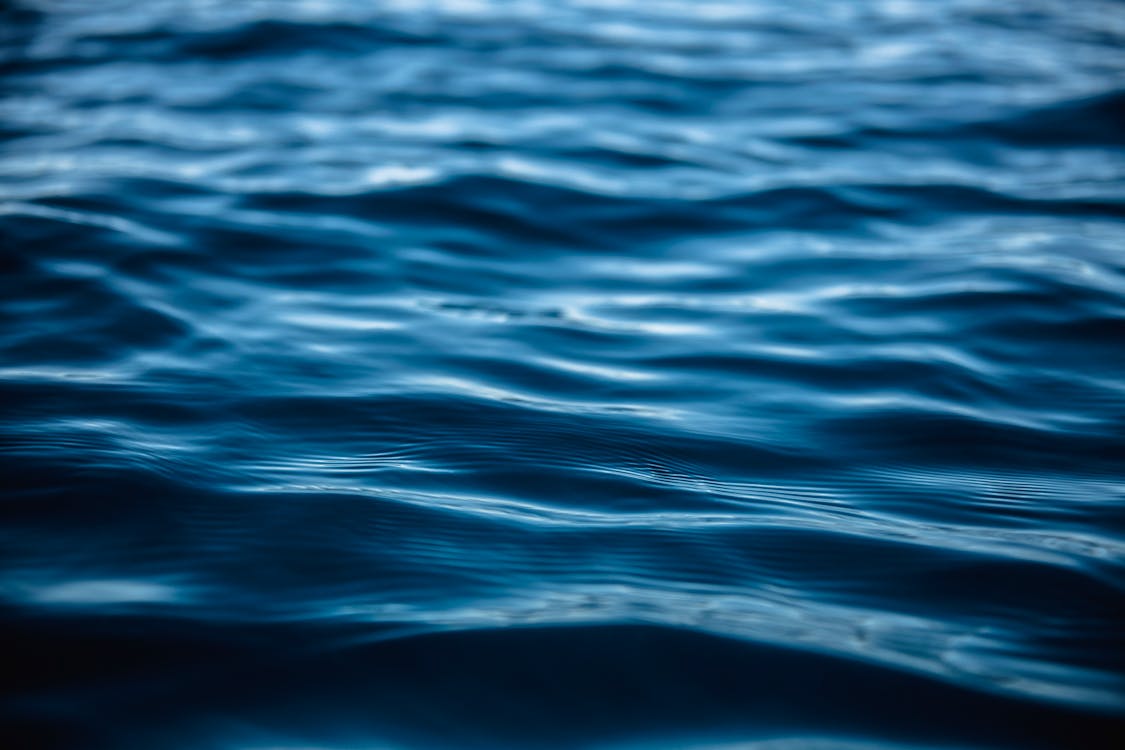 Close-up Photography of Body of Water