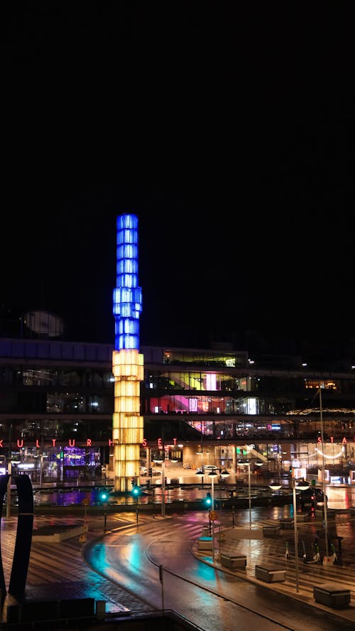 Illuminated Tower in City at Night