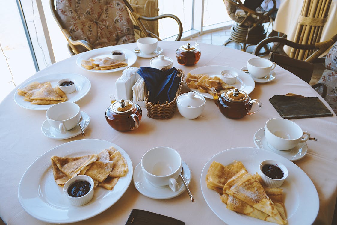 Free White Ceramic Dinnerware on Table Stock Photo