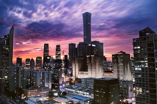 Free High-rise Buildings during Nighttime Stock Photo