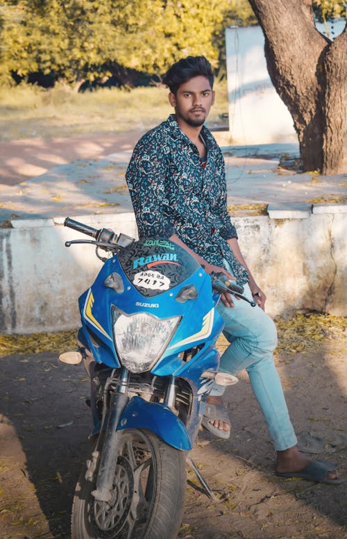 Man Sitting On Bike