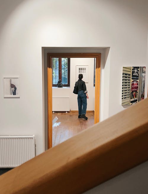 Photo of a Woman in an Art Gallery