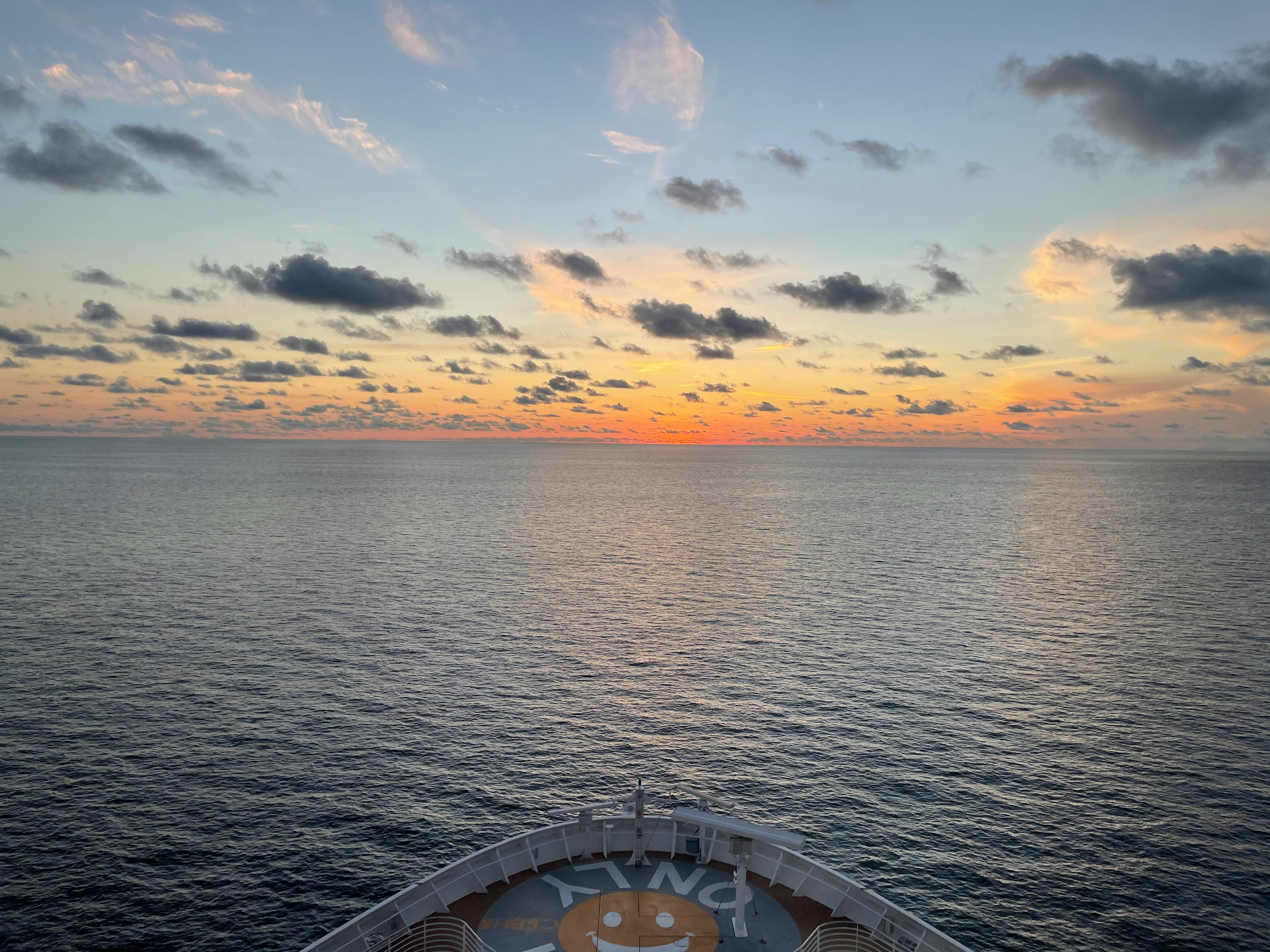 A Pirate Ship Sailing on Sea during Golden Hour · Free Stock Photo