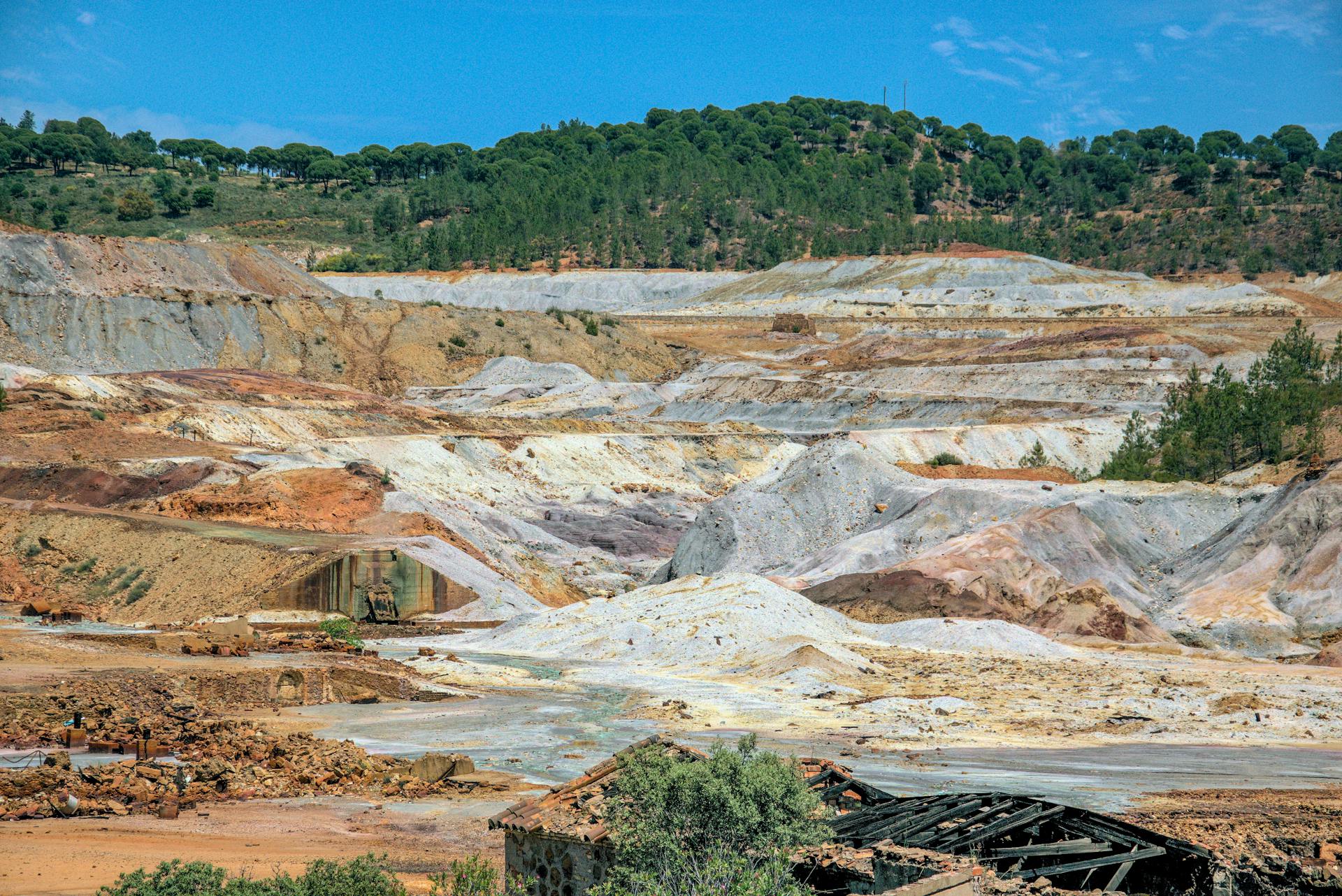 A vast industrial mining landscape in Minas de Riotinto, showcasing the earthy textures and mineral colors.