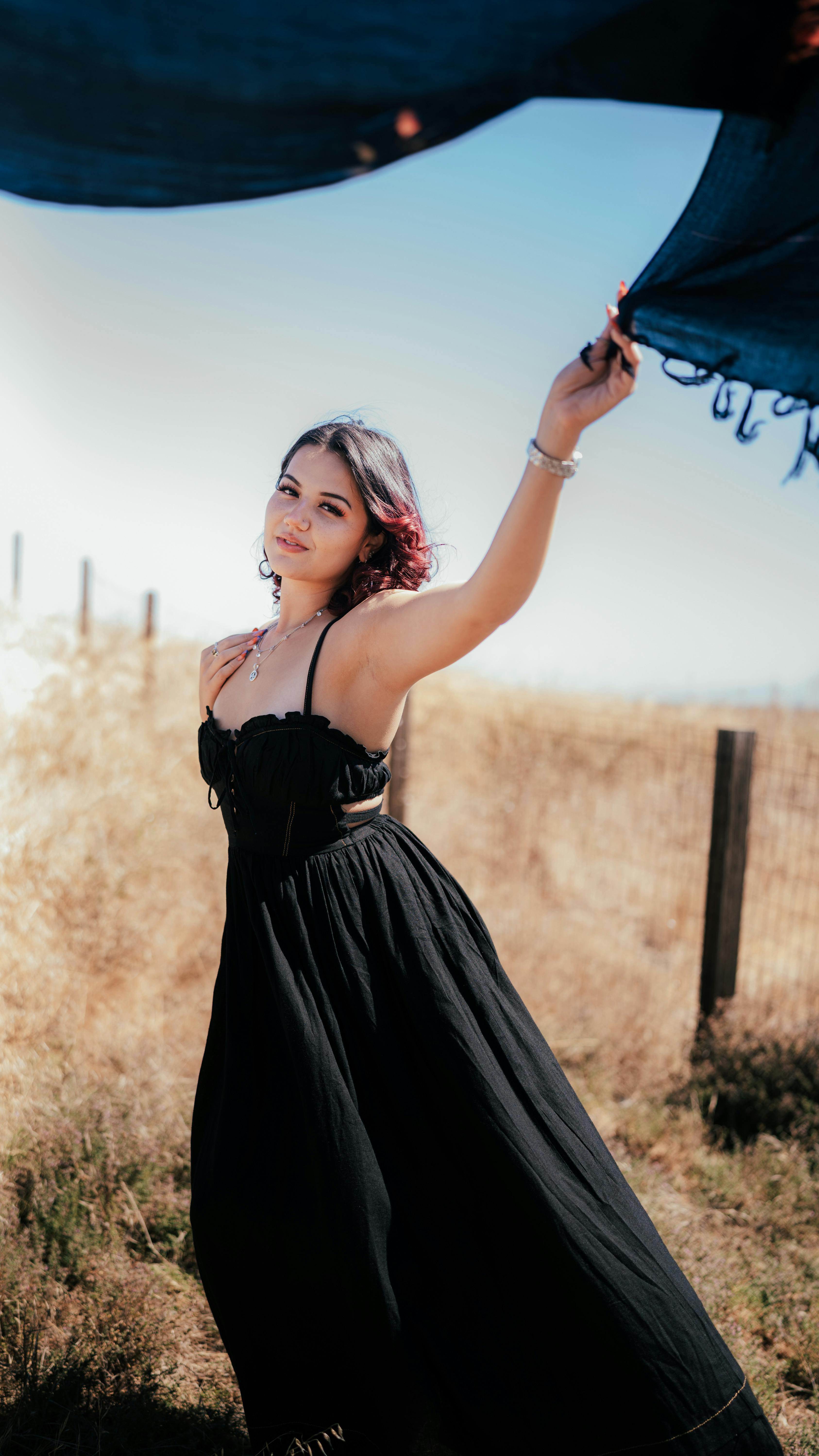 Young Woman Posing Outdoors In Short Black Dress Stock Photo, Picture and  Royalty Free Image. Image 38679310.