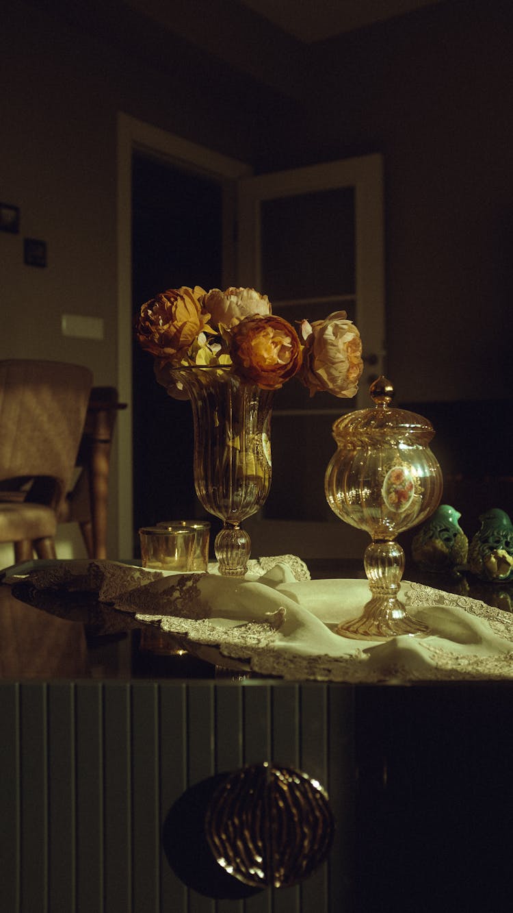 Bouquet Of Roses In Glass Vase In Table