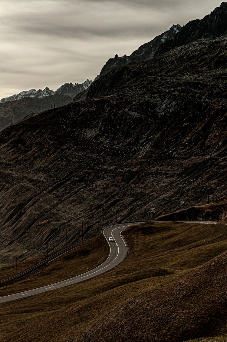 A Road Beside A Mountain