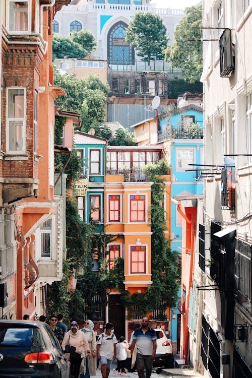 Townhouses Towering over Pedestrians in Narrow Alley