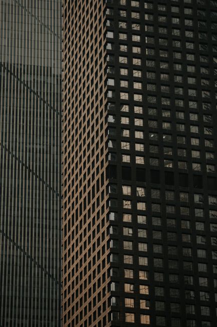 Close-up of modern skyscraper facades showcasing urban architectural detail.