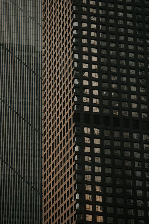 Free Close-up of modern skyscraper facades showcasing urban architectural detail. Stock Photo