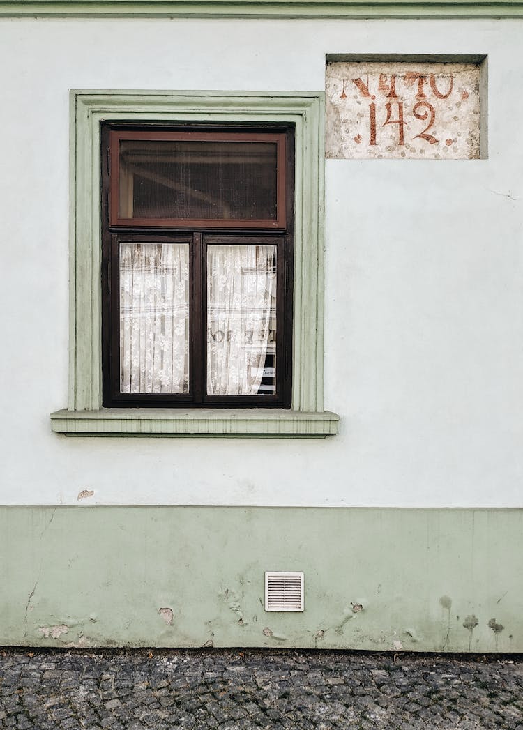 Glass Window On Concrete Wall