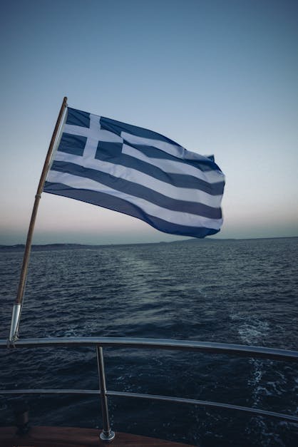 Greek Flag on Ship at Sea · Free Stock Photo